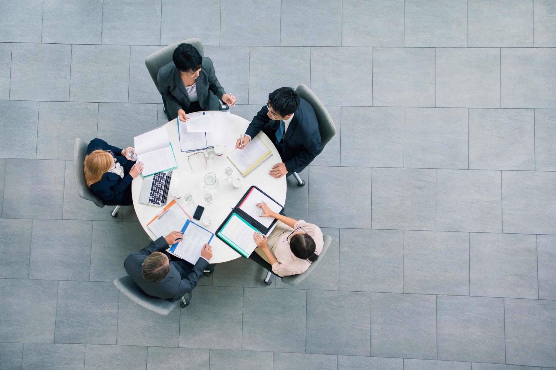 Business people having meeting at table