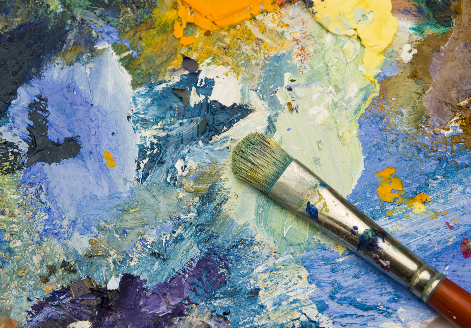 Artists acrylic paint palette close up semi abstract background